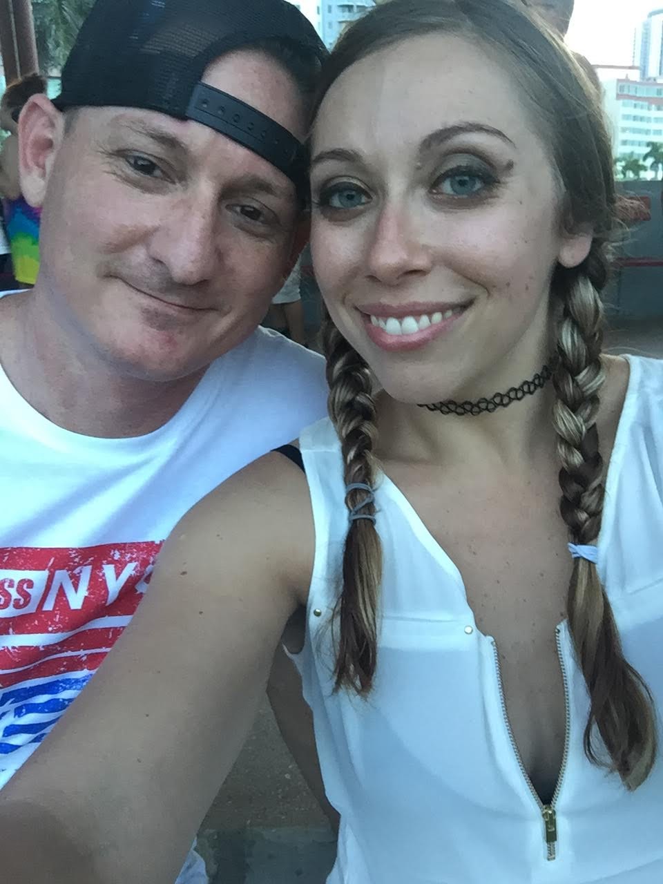 Justin and Shaina smiling together outdoors