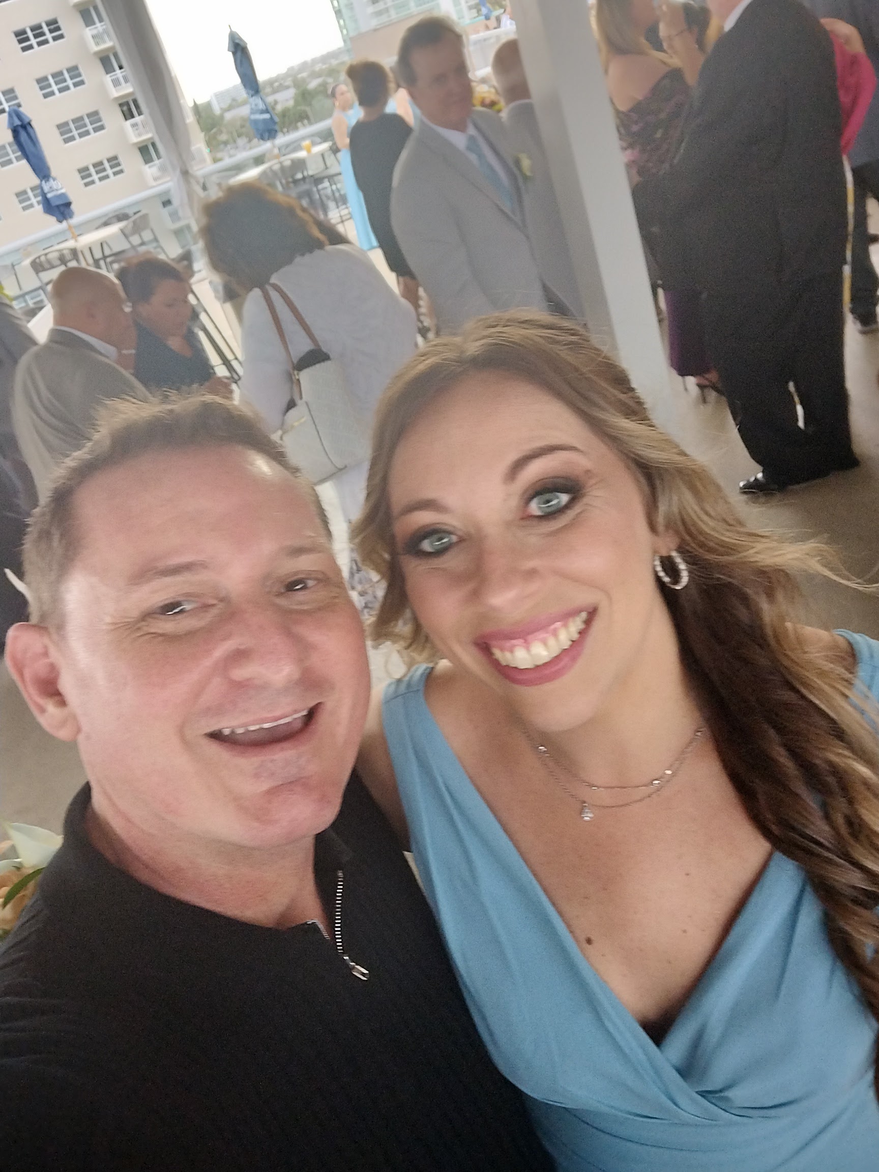 Justin and Shaina smiling together at a special event